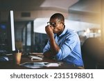 Small photo of Black business man, stress and headache in night, office and fatigue by computer for project deadline. African businessman, burnout or anxiety in workplace by pc, web design startup and mental health