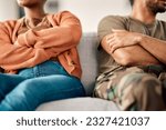 Small photo of Fight, argument and couple on sofa in therapy for conflict, marriage problem and divorce counseling. Psychology, mental health and upset woman with military man or veteran for ptsd, issue and support