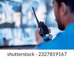 Small photo of Security guard, radio and cctv monitor, communication and inspection service for building safety. Screen, video surveillance agency and law officer in control room talking on two way intercom system.