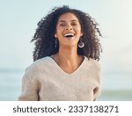 Portrait, African woman and happiness at the beach or holiday, vacation and summer at the sea, ocean in Puerto Rico. Travel, freedom and smile on face for nature, adventure and blue sky mockup