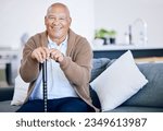 Small photo of Portrait, home and old man with a smile, walking stick and relax with retirement, peace and calm on a couch. Senior person in a living room, elder or pensioner on a sofa, cane or support with health