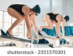 Small photo of Swimming race, sports and people start challenge, competition or performance workout in gym club pool. Swimmer, swimmer and competitive athlete ready for cardio practice, match or stroke practice