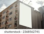 Apartment building, mockup space and advertising billboard, commercial housing and real estate in city. Empty poster for property marketing, branding and communication with announcement in urban area
