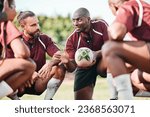 Fitness, huddle and rugby team on a field planning a strategy for a game, match or tournament. Sports, diversity and captain talking to group at training, exercise or practice on an outdoor pitch.