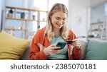 Small photo of Woman, credit card and phone for online shopping in home with digital payment, fintech and finance of money. Happy person on sofa for mobile banking, ecommerce and password for sales on financial app