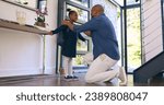 Small photo of Back to school, getting ready and a girl student with her dad in their apartment together to say goodbye. Black family, kids and a man parent helping his daughter with her backpack while leaving home