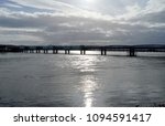 Small photo of The South Esk Viaduct, railway bridge in Montrose. Scotland, built in 1879 by Sir Thomas Bouch, architect of ill-fated Tay Bridge. Following Tay Bridge disaster this bridge was redesigned and rebuilt