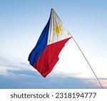 Small photo of philippines flag. Large Philippines flag waving in the wind. Philippines Independence Day. Philippine memorial holiday. June 12. Philippines national flag waving.