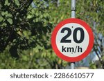 A traffic sign informing the speed limit of up to 20km per hour