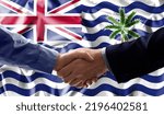 Small photo of Handshake friendship British Indian Ocean Territory flag waving Celebration, Beautifully waving flag Close up of flag.