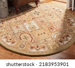 Traditional woven oriental wool area rug.