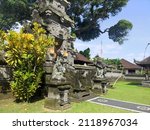 Small photo of Gading Wani temple gate in Tabanan Bali. Typical Balinese architecture is equipped with two statues on the front.