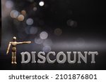 text discount on a dark background with bokeh .