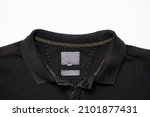 Black shirt collar with button. ...