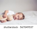 Sleeping Baby In Bed  Holding A ...