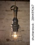 Vintage Caged Inspection Lamp...