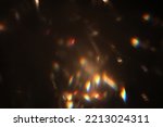 Abstract lens flare light over black background. Lens flare lights. Bokeh Prism Light Flares Overlay on Black Background. abstract Bokeh Lights. light leak. natural light effects.