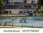 Small photo of BLED, SLOVENIA - JUNE 13, 2021: groups of two young male adults, rowers, on coxless pair rowing boats, training for rowing for an aviron competition on the Bled lake, in summer, in Slovenia.