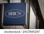 Small photo of DUSSELDORF, GERMANY - NOVEMBER 7, 2022: Brics bags logo in their local store in Dusseldorf. Bric's is a German brand of luxury leather bags.