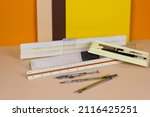 Small photo of vintage objects retro tool measurement school university ruler rulers slide rule pen circle set circles pencil 1970 80s 90s background isolated office pattern mid century space age design danish