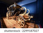 Small photo of London, England, United Kingdom - July 24, 2022. Royal Carriage, Diamond Jubilee State Coach used during King Charles III Coronation procession. On display at the Royal Mews.
