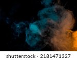 Small photo of movement of a cloud of cigarette vapour in different colours degrading from orange to blue, on dark background. banner with illuminated coloured smoke.