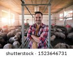 Portrait Of Happy Farmer With...