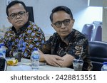 Small photo of Wilson Lie Simatupang, Deputy Commissioner for Legal and Administration (left) and Sid Herdi Kusuma, Deputy Commissioner for Fund Utilization (right), BP Tapera Period 2024-2029