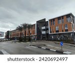 Small photo of Kiryat Ata, Israel - 02.01.2023: the image illustrates development of Kiryat Ata, by depicting the new "Brands" office building
