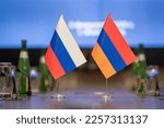 Small photo of Flags of cooperation between Russia and Armenia. close-up