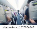 Small photo of aerophobias concept. plane shakes during turbulence flying air hole. Blur image commercial plane moving fast downwards. Fear of flying. collapse slump, depression, downfall, debacle, subsidence. dive