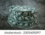 Small photo of A traditional Omani cap in beautiful colors called kumma , which is part of the Omani traditional costume