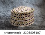 Small photo of A traditional Omani cap in beautiful colors called kumma , which is part of the Omani traditional costume