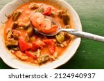Small photo of Louisiana Gumbo, chock-full of shrimp, chicken, sausage, okra and tomatoes. This flavorful stew is a staple in Louisiana.