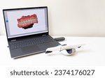 Small photo of 3D Scanned Picture of Scanned Teeth on Monitor of Computer, Notebook. White 3d Intraoral Dental Tooth Scanner Lying on Table. Copy Space. Dental Equipment, Device For Scanning Teeth. Horizontal Plane