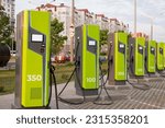 Small photo of EV charges the electric vehicle. A power source for charging an electric vehicle. Socket for a car charger. Charging station for electric vehicles in the parking lot. Natural energy