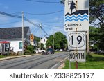 Small photo of Mabou, Canada - Jul 26, 2023: Sign for Ceilidh (Gaelic for party) Trail. The area has many musicians skilled in Celtic music, such as The Rankin Family, of which 2 sisters own the Red Shoe Pub on lef.