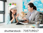 Small photo of cheerful elegant female customer feeling happy when travel agent company manager woman using mobile pad computer showing special price for her.