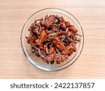 Small photo of Sambal balado teri kacang tempe is fried anchovy, peanuts and tempeh with chili sauce. Indonesian food.