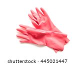 Red rubber gloves for cleaning on white background, housework concept