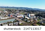 Small photo of Aerial view of Amity, Oregon looking southeast with back view of Amity Co-Op grain elevator and Amity-Eola Hills.