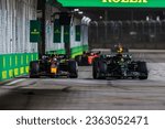 Small photo of Marina Bay Street Circuit, Singapore, Singapore, 17.September.2023; George Russell of Great Britain and Mercedes-AMG PETRONAS F1 Team and Max Verstappen during Formula One Singapore Grand Prix