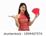 asian girl holding red... | Shutterstock . vector #1909407574
