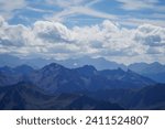 Magnificent panorama of the Pyrenees mountain range and the Brèche de Roland from the Pic du Midi de Bigorre, in the Hautes-Pyrénées

