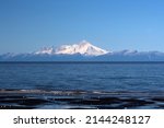 View of the Cook Inlet in Alaska with Mount Iliamna in the background