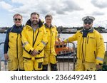Small photo of North Shields, North Tyneside, UK. September 22nd 2023. RNLI crew on the Fish Quay, North Shields, North Tyneside, UK, on the River Tyne.