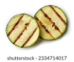 grilled zucchini slices isolated on white background; top view