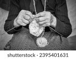 Hands crocheting traditional...