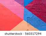 Colorful (purple, blue pink and beige) brick wall as background, texture