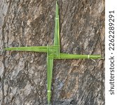 Small photo of St. Brigid's cross made from green rushes.
